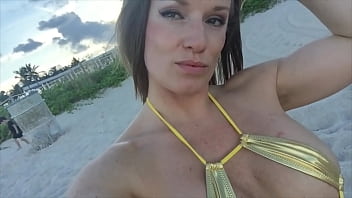 Jillian Goes To The Beach In A Tiny Gold Bikini
